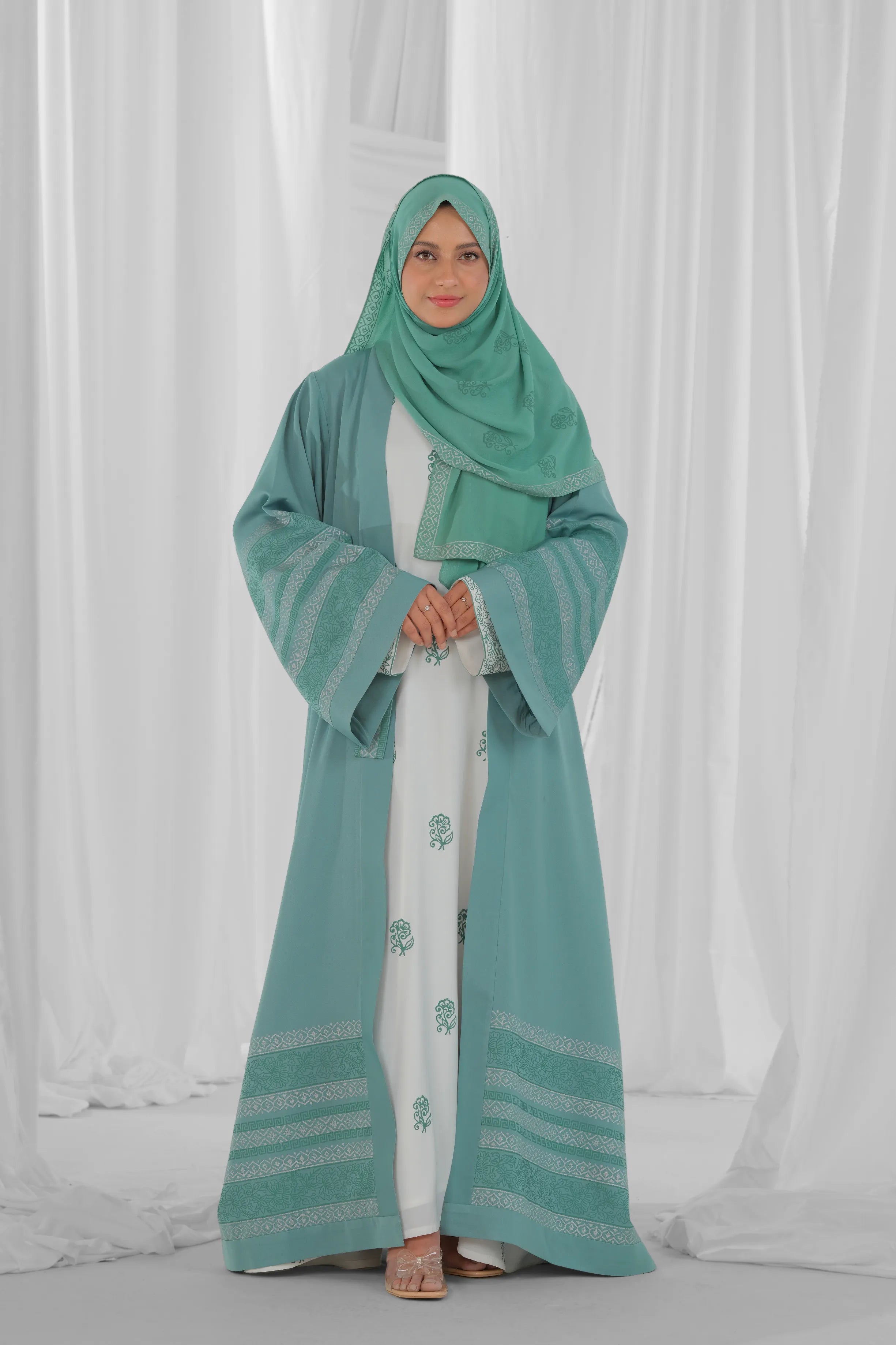 mint green and white abaya 1