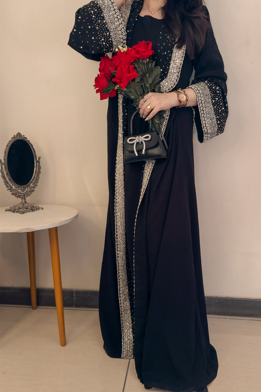 woman wear black coat abaya