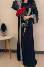woman wear black coat abaya
