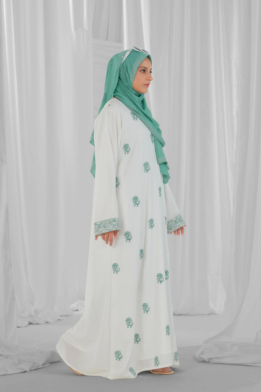 mint green and white abaya 7