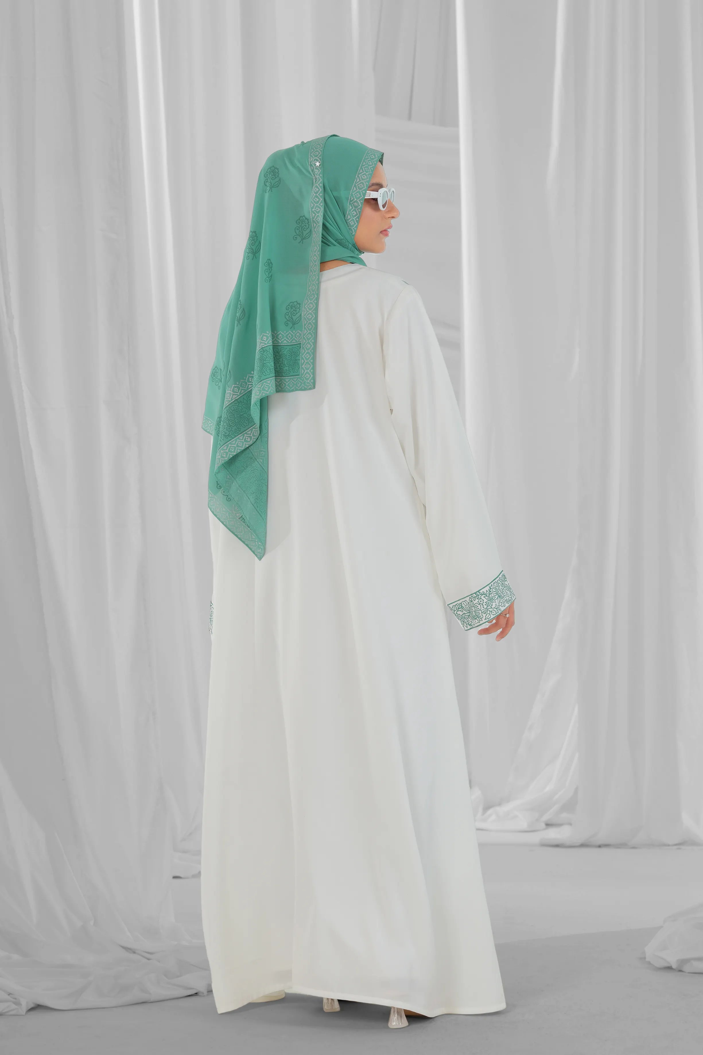 mint green and white abaya 6