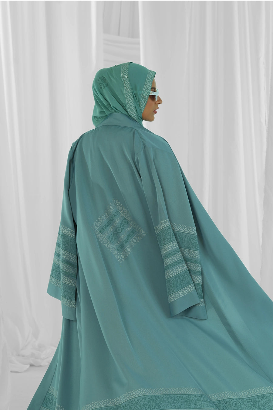 mint green and white abaya 8