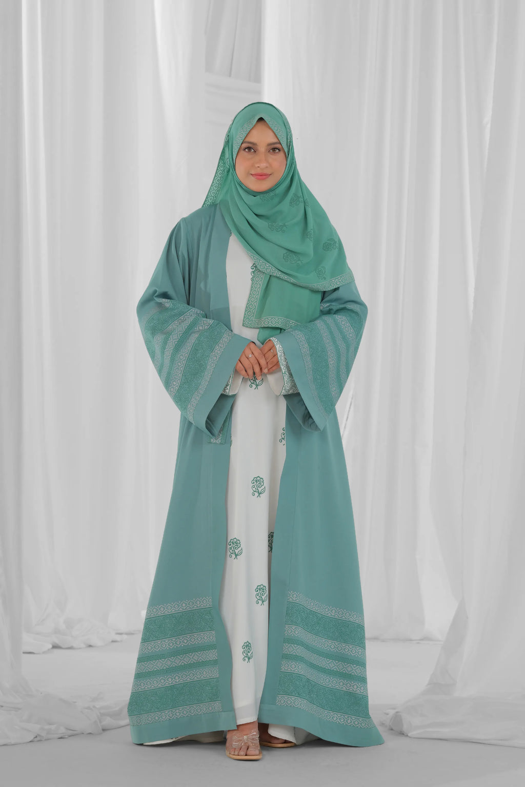 mint green and white abaya 1